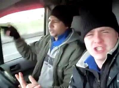 Two blokes on their way to work singing in the van!